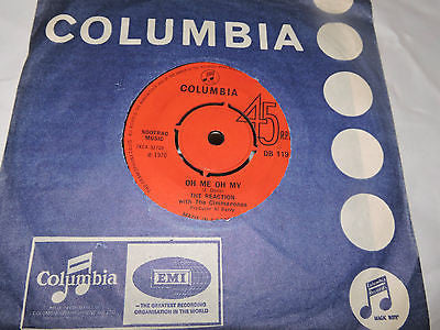 The Reaction | With The Cimmarones / Reco With The Cimmarones | Oh Me Oh My / It's Love (7" single)